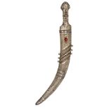 An Indian silver mounted jambiya, curved blade 14”, with a simple decorative central panel, the