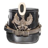 A Prussian Jager enlisted man’s shako, the grey steel plate showing hints of plating or gilding,
