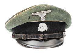 A Waffen SS Infantry NCO’s peaked cap. Fieldgrey good quality material, zinc eagle and skull