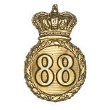 An Other Rank’s 1816 (Regency) pattern brass shako badge of The 88th (Connaught Rangers)