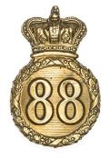 An Other Rank’s 1816 (Regency) pattern brass shako badge of The 88th (Connaught Rangers)