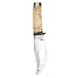 A Bowie knife, stubby blade 6”, of exaggerated form, ivory grip nicely carved on both sides in the