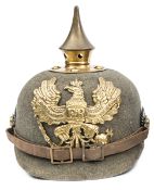 A Prussian enlisted man’s grey felt “ersatz” pickelhaube, with reinforced turned over rim, brass