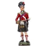 A continental painted porcelain figure of an officer “79th Cameron Highlanders 1814” in full dress