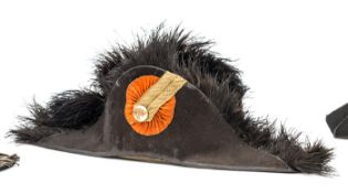 A late 19th century Dutch army officer’s cocked hat, of black beaver, the edges trimmed with black