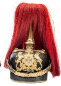 A Wurttemburg Reserve Dragoon officer’s pickelhaube, with gilt mounts, the plate with reservist’s