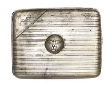 An SS presentation art deco style silver cigarette case, front with eagle and swastika in centre,
