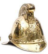 An unusual London Fireman’s gilt brass helmet, front peak and large back peak, crest with embossed
