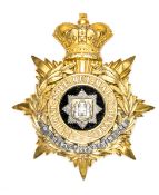 A fine Victorian officer’s gilt and silver plated helmet plate of The East Surrey Regiment, velvet