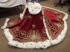 A set of replica coronation robes for Emperor Napoleon and Josephine, of crimson velveteen with