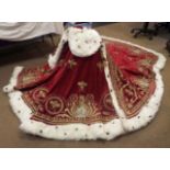 A set of replica coronation robes for Emperor Napoleon and Josephine, of crimson velveteen with