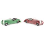 2 Dinky Toys 38 series Alvis (38d). One in green with black interior and black wheels. The other
