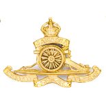 An officer’s gilt cap badge of the Jamaica Militia Artillery, moveable wheel. Near VGC, the gilt
