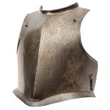 A heavy mid 17th century “Cromwellian” breast plate, with plain turned over edges around the arms