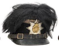 A Saxony Jager NCO’s felt shako, with bi-metal plate, silver lace around the top of the skull, black