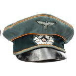 A Third Reich Military Police (Feldgendarmerie) officer’s peaked “crusher” cap, with machine woven