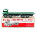 Dinky Supertoys Foden Flat Truck (502). An early DG example in dark green with black chassis, with