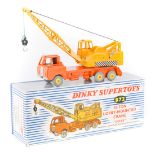 A late issue Dinky Supertoys 20-Ton Lorry Mounted ‘Coles’ Crane (972). In orange and yellow