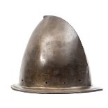 A cabasset, c 1600, formed in one piece, the narrow brim with turned over edge, the crown with