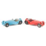 2 Dinky Toys 38 series Jaguar (38f). One in light blue, with mid-grey interior and black wheels. The