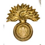 An Ed VII brass grenade cap badge of the R Australian Artillery, lug and screw stud fastening. GC