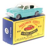 Matchbox Series No.43 Hillman Minx. In turquoise and cream with grey plastic wheels. Boxed, light