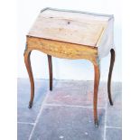 A French marquetry inlaid and gilt metal mounted rosewood writing table. H90cm