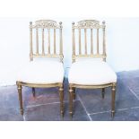 A pair of French gilt wood chairs, paper label to one C Mellier & Co. H85cm