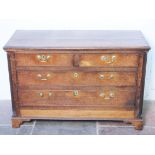 A Georgian oak chest of drawers on bracket feet. W125cm D55cm H82cm