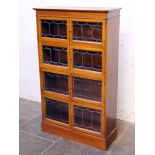 An early 20th Century leaded glass bookcase. W89cm D33cm H148cm