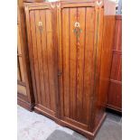 A Victorian Reformed Gothic or Aesthetic Movement pitch pine wardrobe with Christopher Dresser style