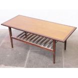 A teak and afromosia coffee table. L122cm D51cm H48cm