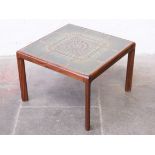 A G-Plan tile top afromosia coffee table. L64cm D64cm H44cm