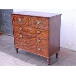 A William IV mahogany chest of drawers with lift top, loop brass handles and turned feet. W1221cm