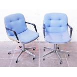 A pair of retro office chairs. H91cm