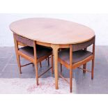 A McIntosh teak oval extending table and four chairs. Min. table dimensions: L153cm D95cm H74cm