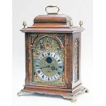 A reproduction carriage clock the dial signed Christiaan Huygens, the spring driven movement