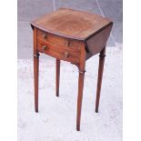 An Edwardian two drawer crossbanded mahogany occasional table. H72cm