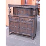 An oak court cupboard.