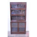 An early 20th Century leaded glass oak bookcase. W86cm D40cm H181cm