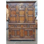 An aged oak cabinet, 20th Century. W129cm D42cm H183cm.