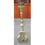 A large brass candle stand. H126cm.