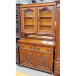 An oak secretaire bookcase circa 1900. W122cm D50cm H207cm.