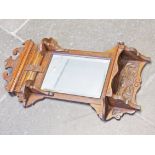 A carved oak framed mirror circa 1900. 48cm x81cm.