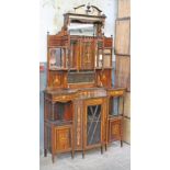 A late Victorian inlaid rosewood display cabinet. W136cm D40cm H240cm