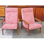 A pair of Danish style afromosia arm chairs. W68cm D77cm H91cm.