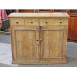 A Victorian pine cupboard. W122cm D40cm H106cm.