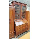 A George III mahogany bureau bookcase (matched). W122cm D57cm H234cm.