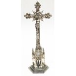 A silver plated crucifix. H55cm.