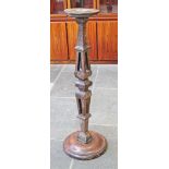 A part 16th/17th Century oak and mahogany stand. H131cm.